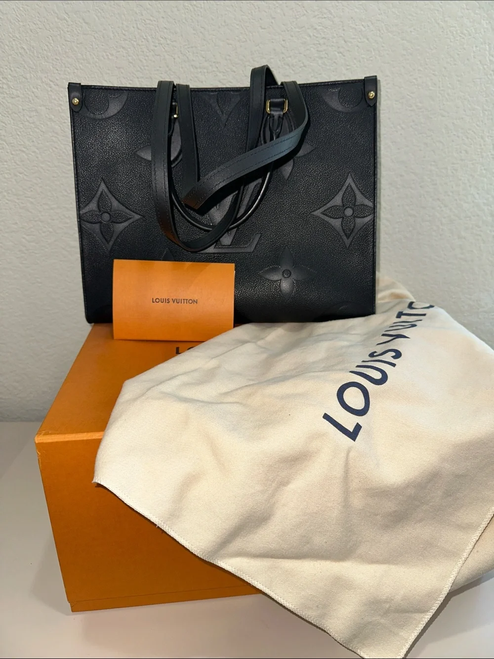 Louis Vuitton Navy Embossed Monogram Tote with Gold Tone Hardware
